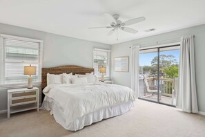 Bedroom 3 with king bed, balcony, Smart TV, and ensuite 
