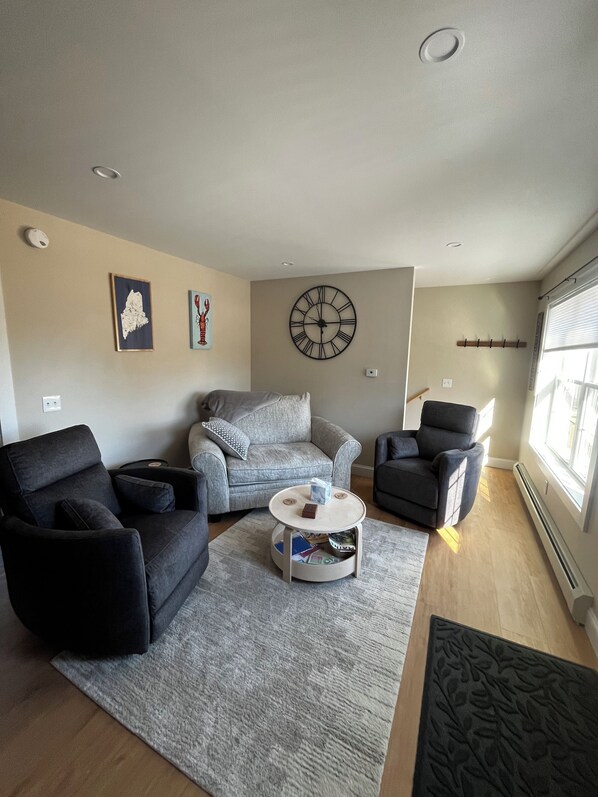 inviting living area, perfect for relaxing, socializing, or unwinding.