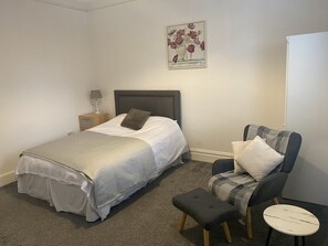 Bedroom and Seating Area