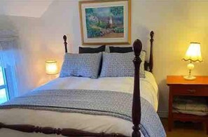 Experience comfort and relaxation in our room featuring a snug double bed