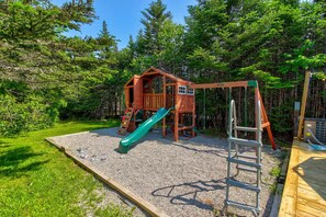 Let the fun begin on this colorful playground slide in Portugal Cove! A wonderful place for children to play, explore, and enjoy the outdoors.  #PlaygroundAdventures #PortugalCove