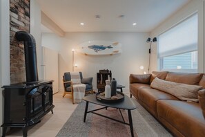  Where comfort meets style!  A cozy leather couch, warm wood stove, and unique decor come together to create the perfect retreat. Sit back, relax, and soak in the charm  #CozyLiving