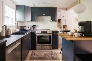 QV Tides features a fully equipped kitchen, perfect for preparing delicious meals during your stay #QVTidesKitchen
