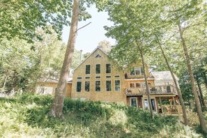 Exterior View of the Entire House. The apartment is located on the lower level.