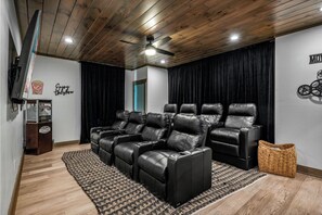 Cozy up in the private theater room for a movie night with the family!