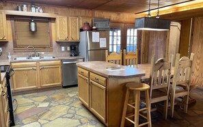 A fully stocked kitchen, ready for your next meal! 🍽️🔥 Whether you’re cooking up a feast or a quick snack, this rustic space has everything you need