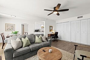 This spacious dining area offers the perfect setting for savoring delicious meals and connecting with loved ones.