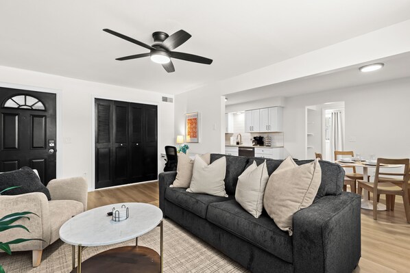 This spacious living room with a smart TV is ideal for movie nights, binge-watching, or catching up on the latest news.