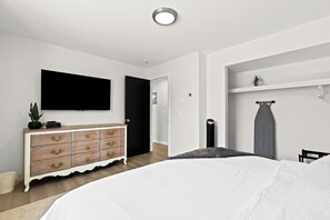 A spacious and stylish king bedroom, perfect for relaxing after a day of adventures.