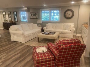 Relax in our open family room with a large TV, comfy sofas, and cozy blankets.