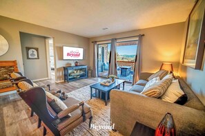 Cozy Branson living room with smart TV and comfortable seating