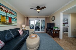 Sliding doors lead out to the screen porch