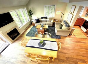 A view from the stairway down over the living/dining space