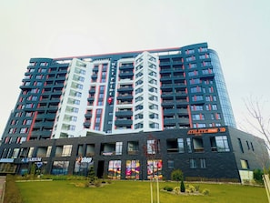 Stay in a modern and secure building with convenient amenities.