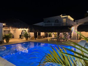 Unwind in style at Beach Walk 4, where sparkling poolside evenings and enchanting ambiance create the perfect tropical getaway!