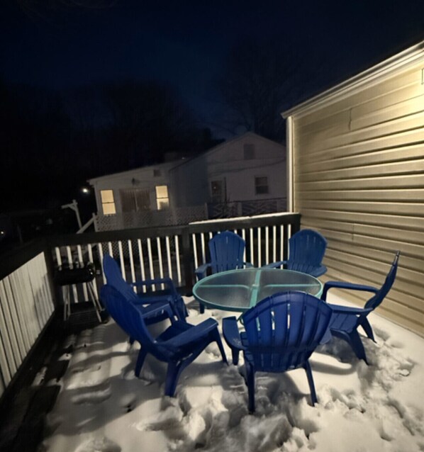 Enjoy a roomy back deck with a grill, surrounded by trees and open space. Whether you're sipping morning coffee or hosting a BBQ, the backyard offers plenty of room to relax and unwind.