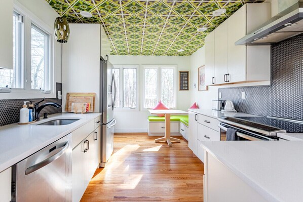 Chefs kitchen with breakfast nook