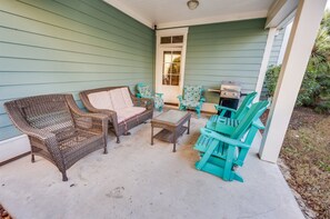- Kick back on the covered patio featuring comfy seating and a laid-back vibe - Fire up the grill and enjoy a meal outdoors in a peaceful setting - Perfect spot for morning coffee, evening drinks, or simply enjoying fresh air.