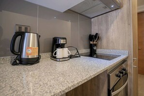 El chef que llevas dentro: Despierta tu creatividad culinaria en nuestra cocina totalmente equipada.