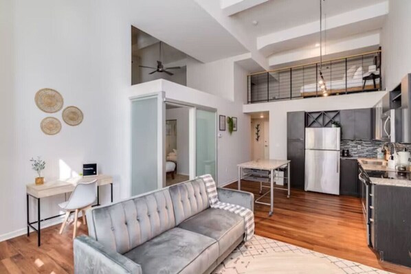 Relax in the living room and watch your favorite shows, lounging is a great way to unwind after a long day.