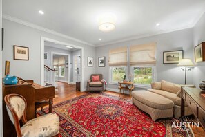 The perfect first impression! This living room greets you as you enter, inviting you to relax and make yourself at home.