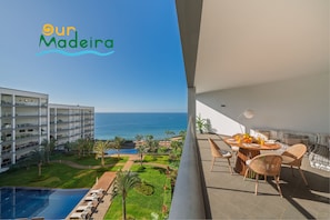 The Spacious Veranda At The Palace Ocean View Apartment By Ourmadeira Showing The View To The Gardens Swimming Pools And Sea