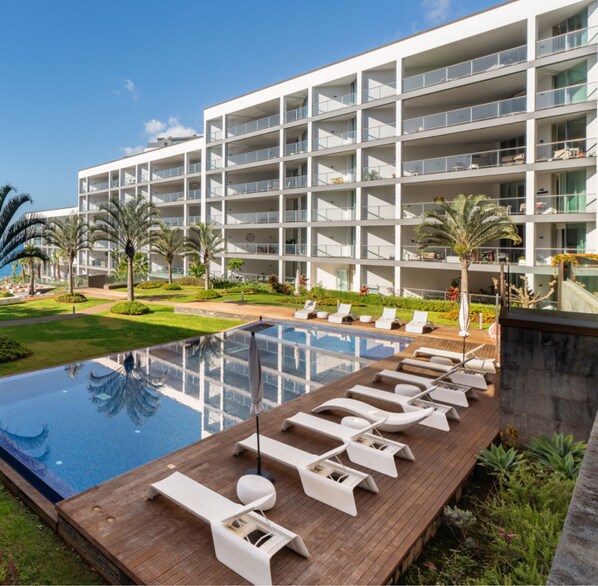 The Beautiful Maintained Gardens And Principle Swimming Pool At The Palace Ocean View Apartment By Ourmadeira