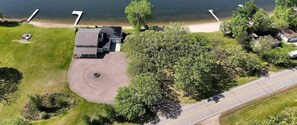 Large circle parking lot. Beautiful landscape with mature trees