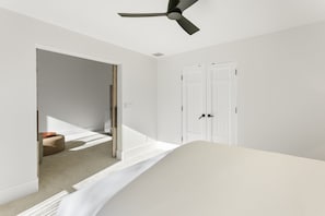 Indoors, Ceiling Fan, Bed, Furniture, Door