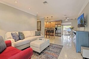 Indoor living and dining room. There's a sleeper sofa for overflow guests.
