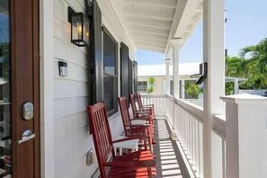 These 4 new wooden rockers are the perfect addition to this Old Town Key West front porch.