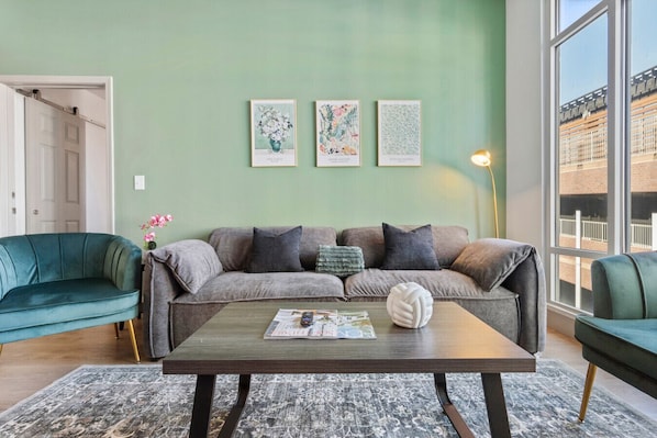 Unwind in the spacious living area complete with a comfy couch to relax after a long day exploring the city!