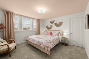 A haven of blush and blooms, where dreams take flight.  Second-floor sanctuary, complete with a king-sized bed. 😴 #dreamybedroom