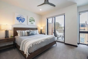 - Wake up to sunshine and step straight onto the balcony for fresh alpine air
- Striped throws, modern art, and wood accents create a breezy mountain vibe
- Comfy king bed and soft carpet make every night feel like a retreat