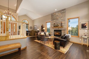 Living Room with Fireplace Flooded with Natural Light