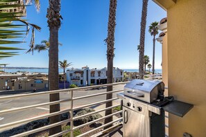 Balcony with outdoor seating and BBQ