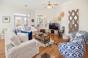 Living room: 65-inch Smart TV, central heat, central A/C