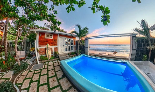 This is Casita 3. Sleeps 2 an amazing place for couples with a bed overlooking the beach. Has TV with Netflix and A/C included as well as your own private kitchen, sink and Bathroom.