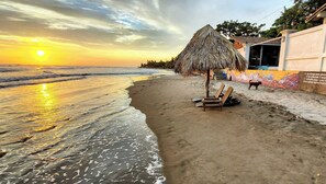 Standard Sunsets here at the Beach House.   Our rancher with seating is the best place on the beach to watch the sun go down every evening.  
