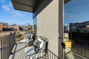 Balcony with city views.