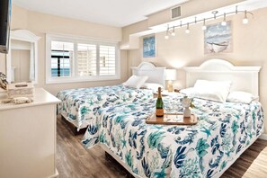 The bedroom has two plush queen beds and plenty of storage for your clothing.  Enjoy watching streaming your favorite TV shows in the evening from the 50" Smart TV.  This is the perfect place to relax and rest after long family or couples beach day.