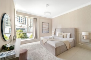 Bedroom Retreat: Bright space with elegant decor and stunning city views awaits your relaxation!