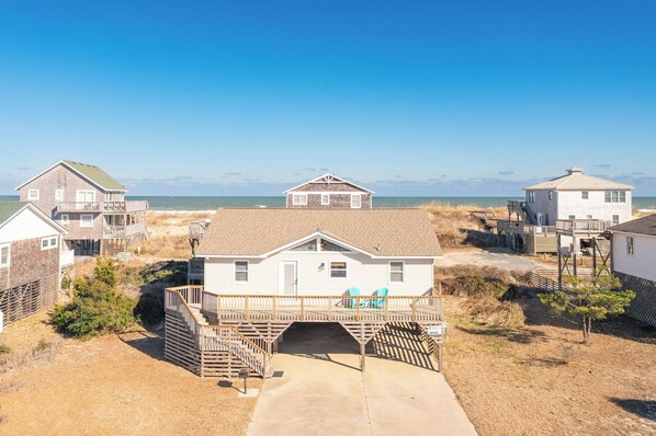 Front Exterior - This beach side beauty is ready to host.