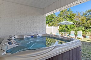 Hot tub on covered patio