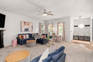 Enjoy natural light, tree views, and a charming entry on the first floor!