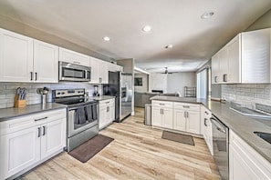 Kitchen: Sleek stainless steel appliances and bright, airy layout perfect for culinary adventures!