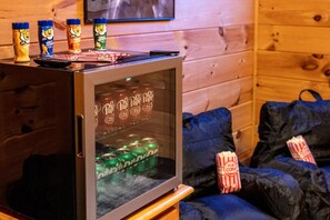 Kids theater room with mini fridge!