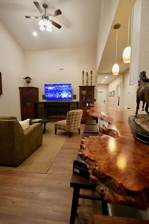Vaulted ceiling and open floor plan maximizes the space in this cozy retreat.