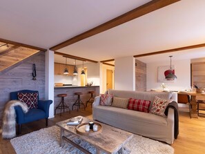 Furniture, Interior Design, Flooring, Wall, Couch, Floor, Wood, Ceiling, Room, Living Room