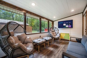Enjoy a variety of games or stream your favorite TV shows in the sun room.